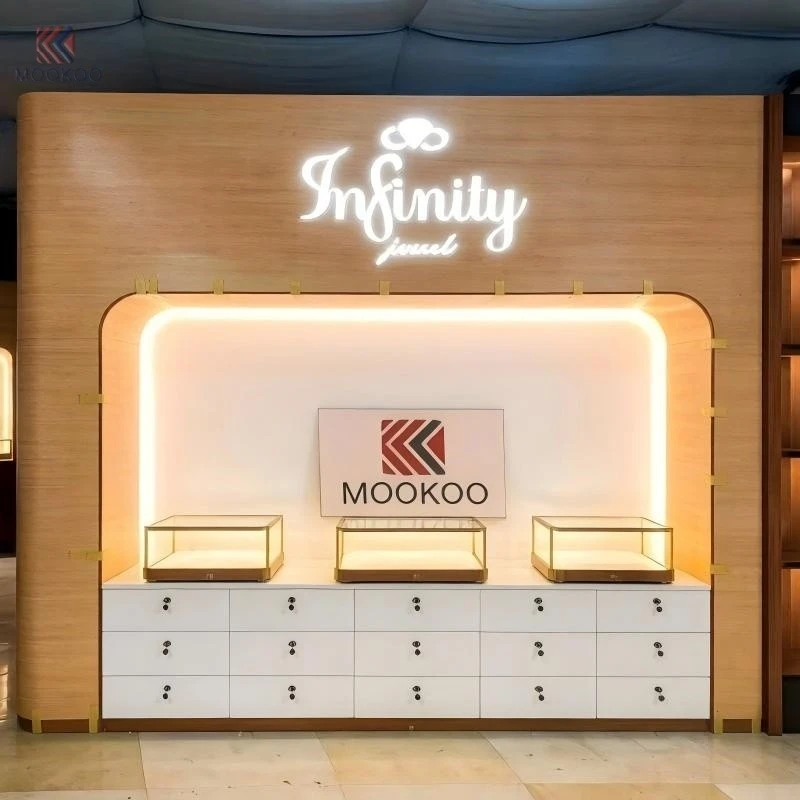 Customized Modern Rotating Metal Jewelry Display Cabinet LED Light Luxury Boutique Jewelry Store Fixture Side Table factory