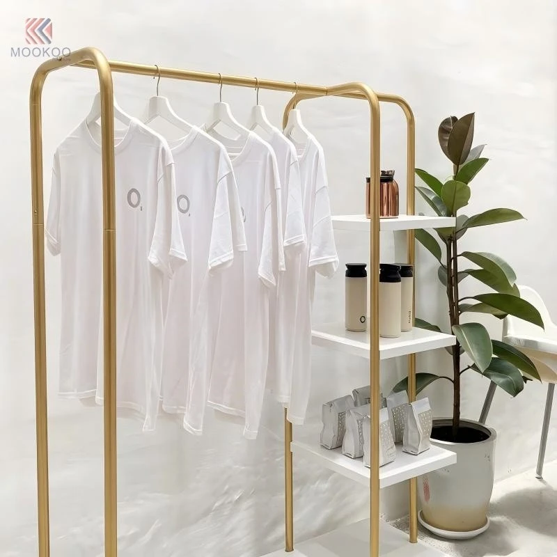 Customized MOOKOO Mobile Gold Metal Clothing Display Rack 1 Tier White Shelves Wheels Modern For Multi-Functional Garment price