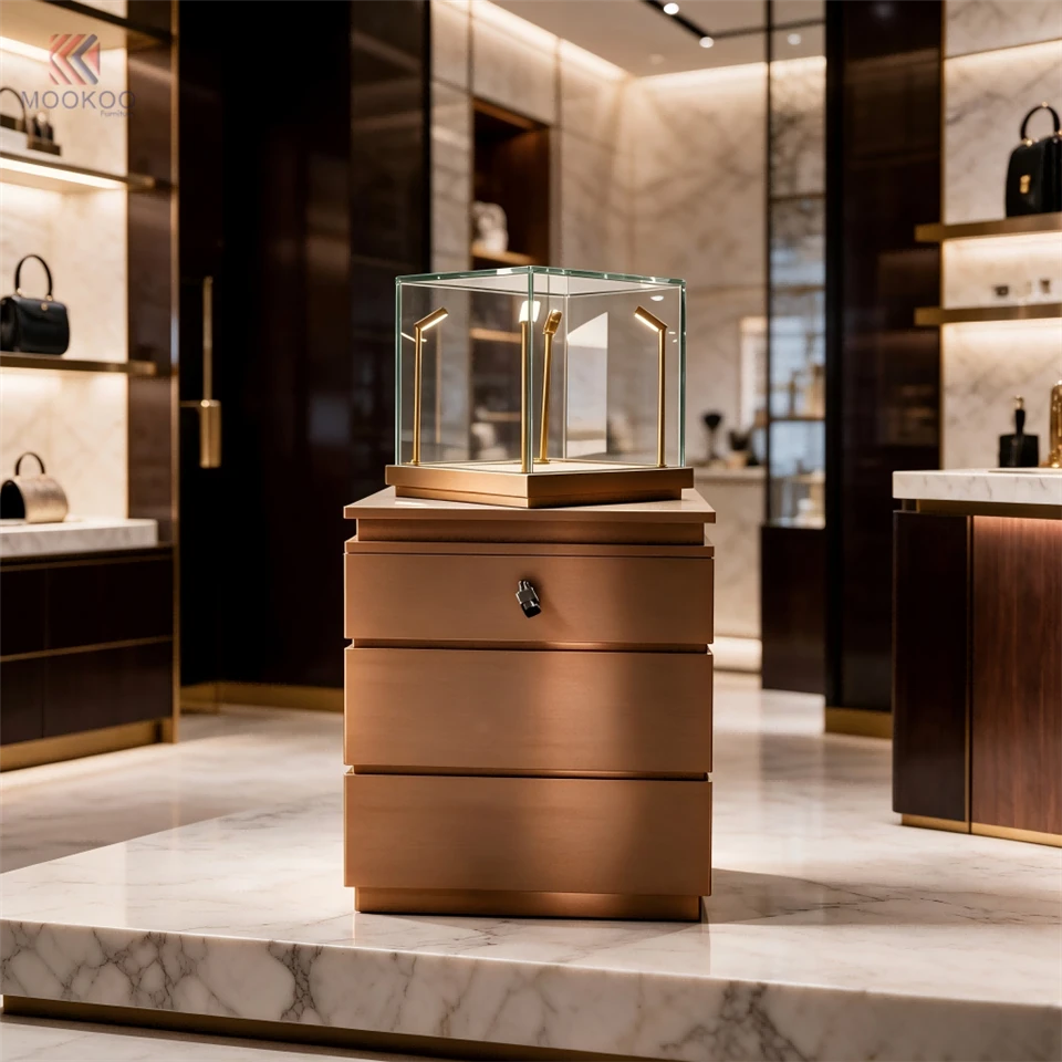 Luxury Bedside Table Lockable Glass Vitrine LED Lighting Brushed Bronze Metal Chest Drawers For High-End Boutique Decor manufacturers
