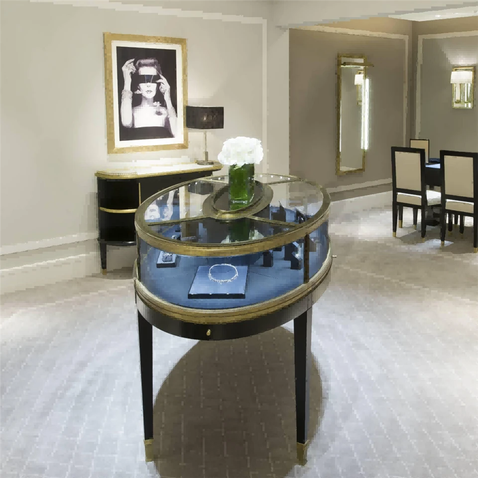 Luxury Vintage-Inspired Gilded Brass Round & Hexagonal Blue-Tinted Glass Jewelry Showcase For High-End Boutiques factory