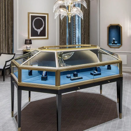 Luxury Vintage-Inspired Gilded Brass Round & Hexagonal Blue-Tinted Glass Jewelry Showcase For High-End Boutiques suppliers