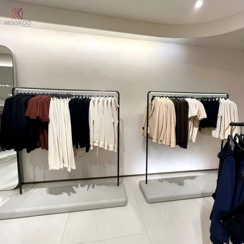 Mookoo Freestanding Metal Rotating Varnish Clothing Display Rack Detachable Easy Assembly Modern Minimalist Retail Garment Stand factory